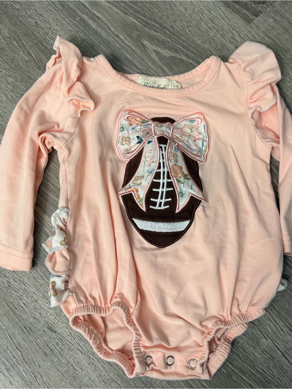 Girls Peach Football Bow Long-Sleeve One-Piece Bodysuit